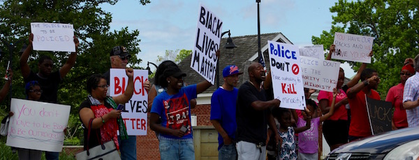 Sunday's protest on Peconic Avenue in Riverhead.