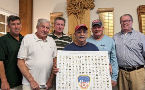 Robert Knudsen, Tom Cunningham, Retired Chief Paul Mannix, Don Cotrone, Thomas J. May and retired Fire Marshal Brian Hughes at Southold Town Hall Aug. 13.