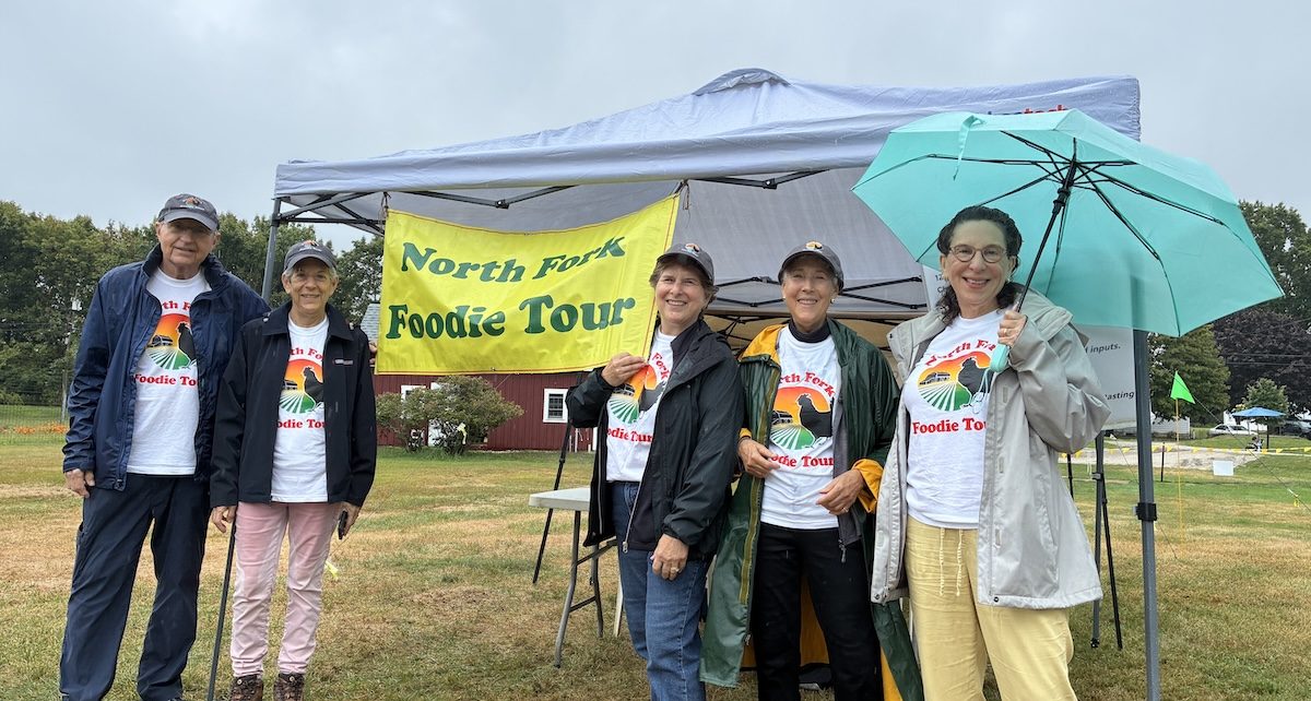 Foodie Tour organizers Robert Deak, Amy Gadol, Sue Hearn, Ellen Zimmerman and Geri Armine-Klein awaited tourgoers Sunday morning.