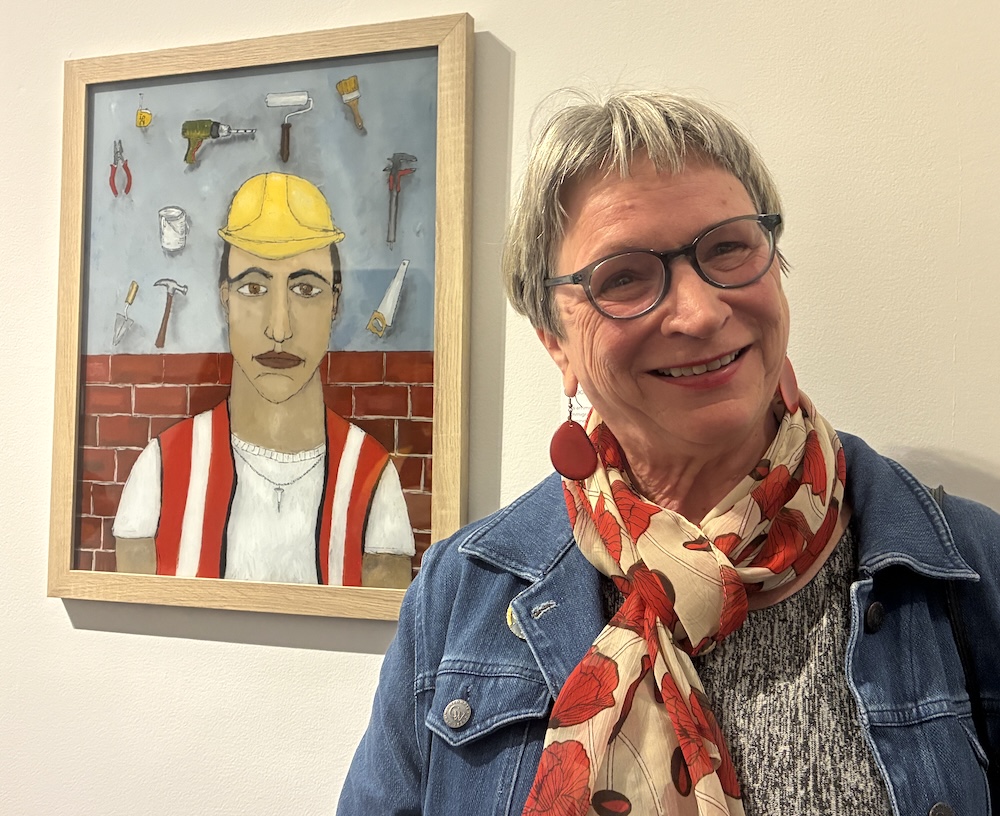 Gabrielle Raacke with her piece, "I Built Your House."